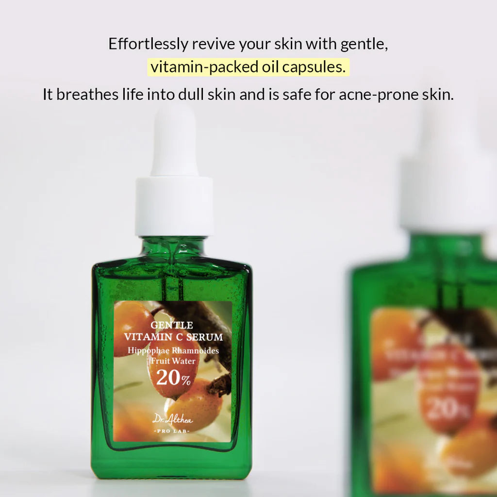 Green bottle of vitamin C serum with text on a white background
