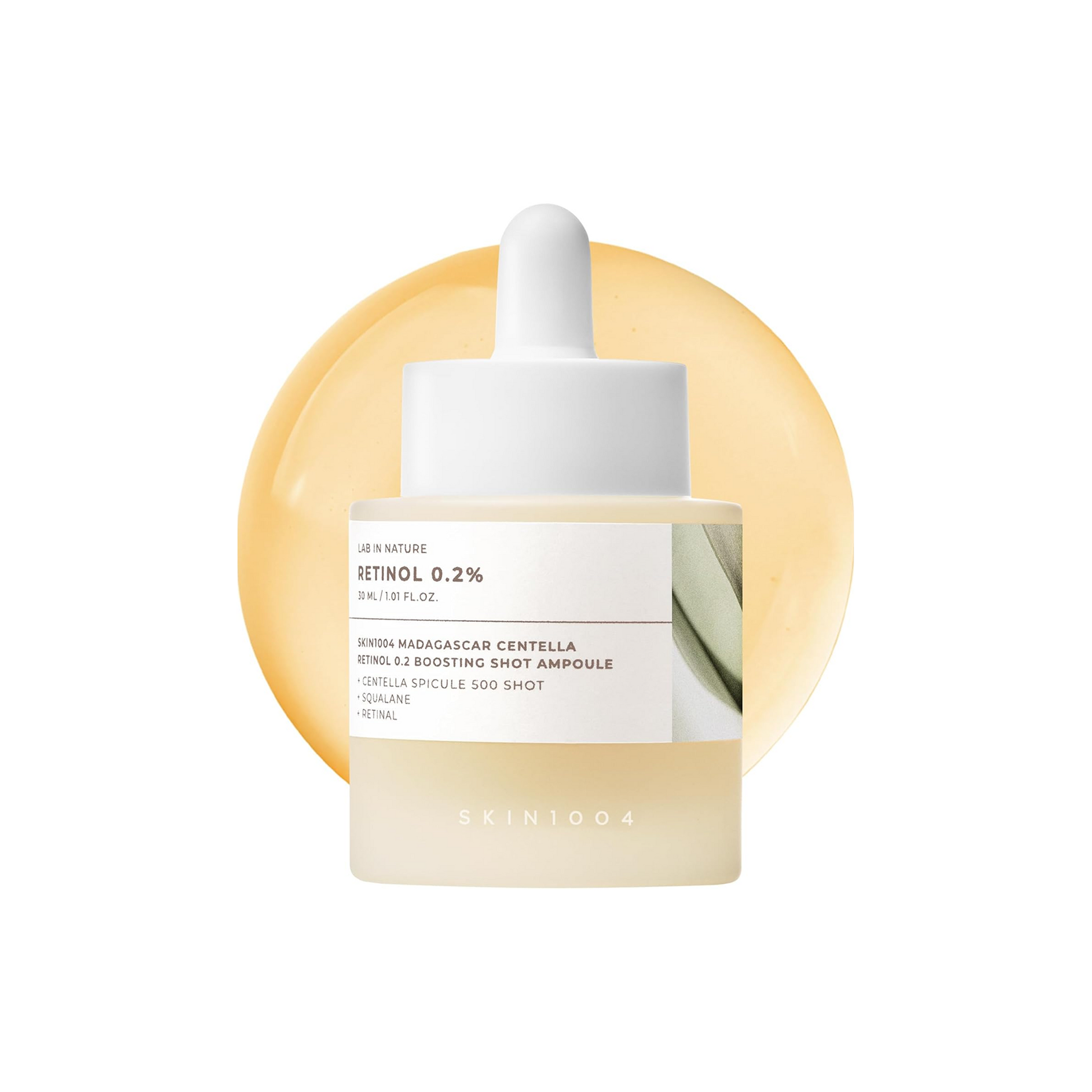 Skincare ampoule bottle with a white cap on a white background