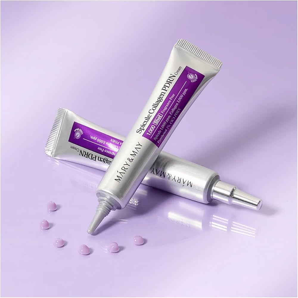 Two skincare products with purple labels on a light purple background