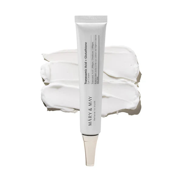 Skincare tube with white cream on a white background