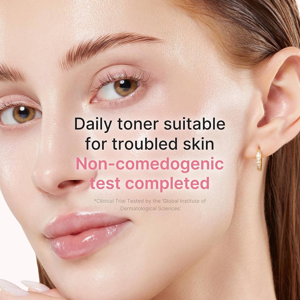 Close-up of a woman's face with text about a daily toner suitable for troubled skin.
