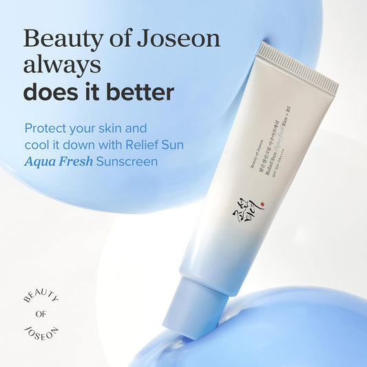 Sunscreen tube with 'Beauty of Joseon' branding on a light blue background