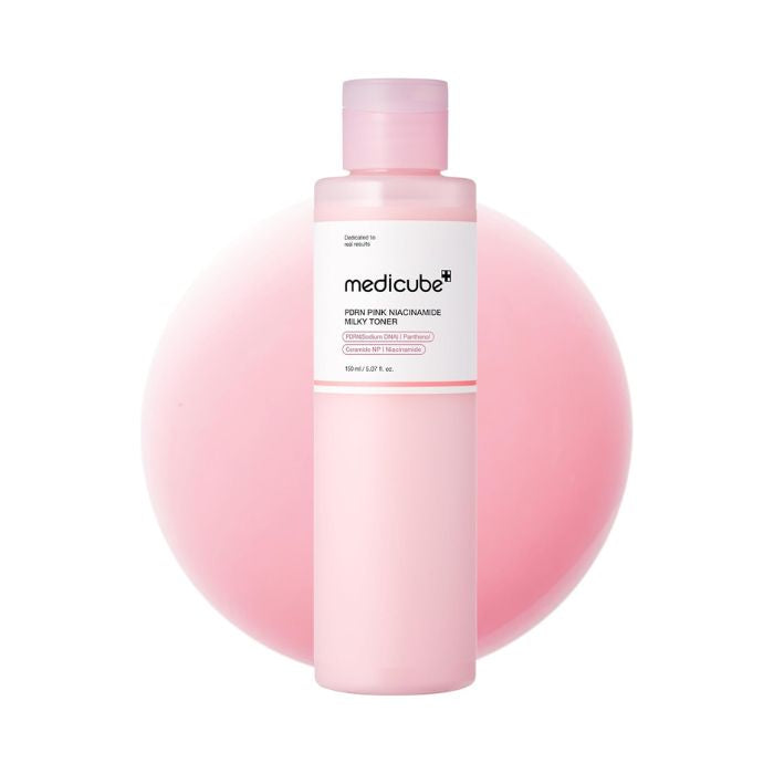 Pink bottle with white label on a white background