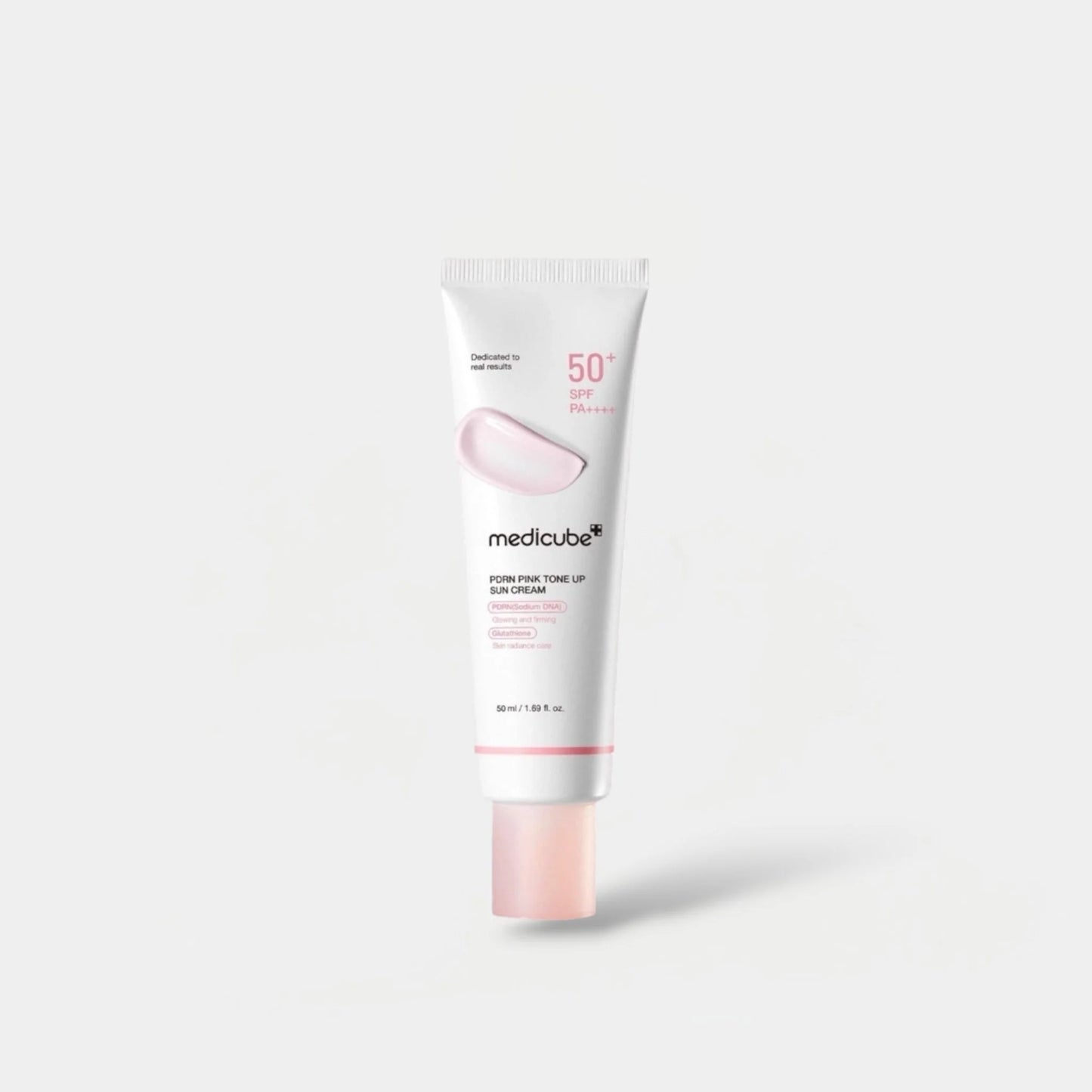 Medicube sunscreen cream tube on a white background