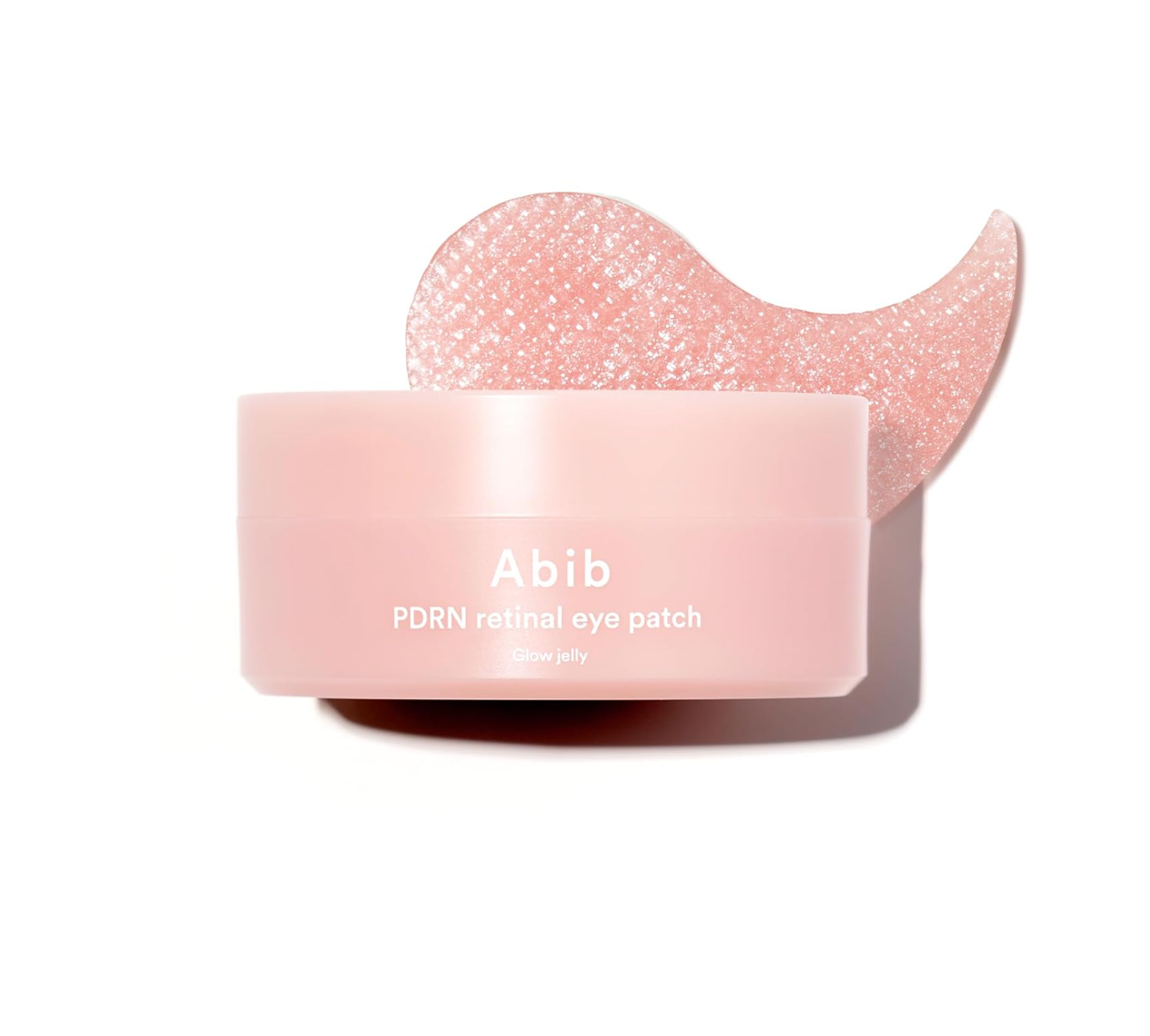 Pink container of Abib PDRN retinol eye patch with a matching pink patch on a white background