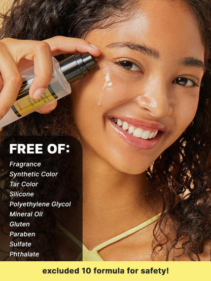 Woman applying sunscreen with a list of ingredients excluded on the left side