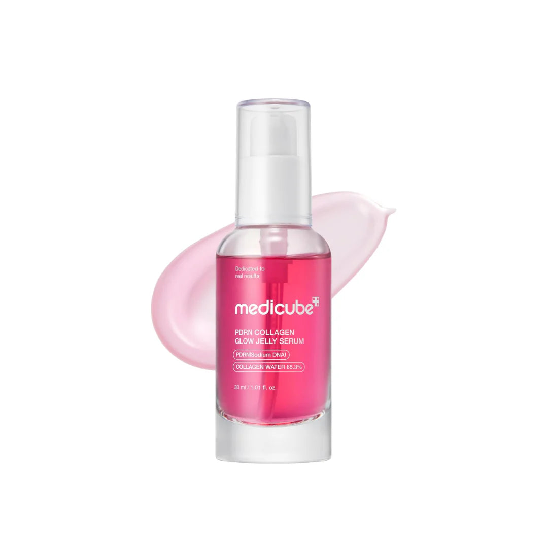 Medicube pink serum bottle with a white cap on a white background